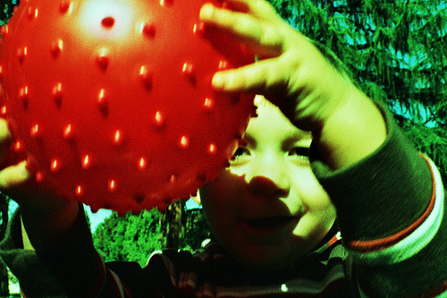 Miles holding a dimple ball - Cross Processed